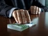 В Крыму налоговик повадился получать регулярные взятки с бизнесмена