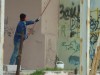 В Керчи закрашивают надписи на фасадах домов